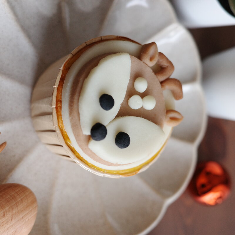 Handmade fondant decorations on PawPa Pastry cupcake